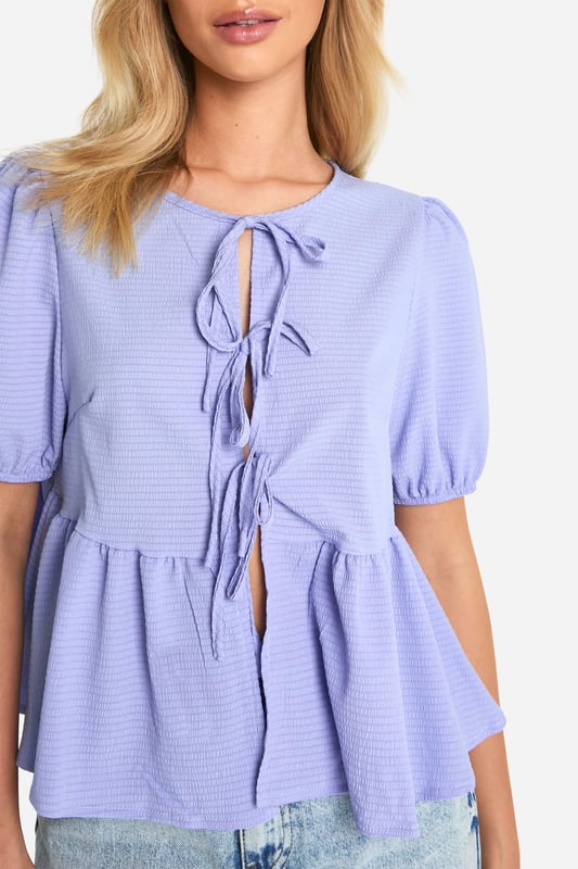Look hot in this pretty smock top, fresh from our latest arrivals. Made from gathered fabric that's designed to stretch, a smock top is skin tight at the top and falls loosely for a flattering fit on all shapes and sizes. Cut to a practical shape, effortless style is made easier with a smocked blouse or top, the perfect throw-on piece you can team with jeans for everyday wear. From laidback crew necks to criss-cross backs, our latest edit is full of fun laid back pieces - choose yours today.Style: Smock TopLength: RegularSleeve Length: Long Sleeve