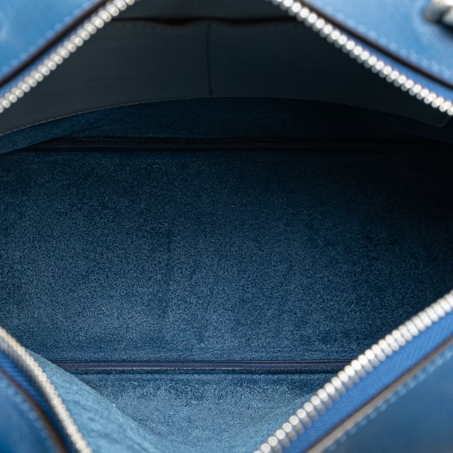 VINTAGE. RRP AS NEW. The Soft Cube satchel features a leather body, flat leather handles, a detachable flat leather shoulder strap, a top zip closure, and interior slip pockets.Interior Lining Worn. Practical Attachment Scratched. Zipper Scratched. 

Dimensions:
Length 20cm
Width 23cm
Depth 10cm
Hand Drop 15cm
Shoulder Drop 53cm

Original Accessories: Dust Bag, Dust Bag

Color: Blue
Material: Leather x Calf
Country of Origin: Italy
Boutique Reference: SSU257352K1342


Product Rating: VeryGoodCondition

Certificate of Authenticity is available upon request with no extra fee required. Please contact our customer service team.