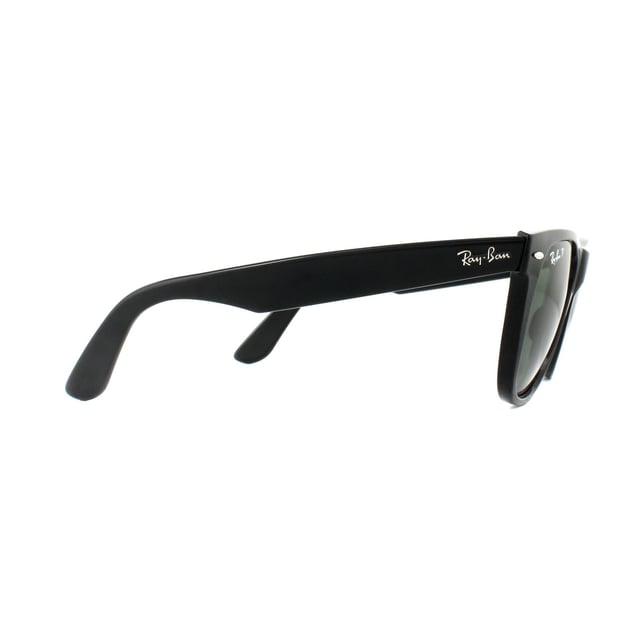 Ray-Ban Sunglasses Wayfarer 2140 901/58 Black Green G-15 Polarized Medium 50mm are one of the most recognisable and bestselling sunglass styles worldwide and are enormously popular among celebrities, musicians and artists. The distinctive angled design and thick frame are sure to make a statement and Ray-Ban are constantly using vibrant colours and patterns to update this classic and popular style. The lightweight acetate frame is comfortable and the Ray-Ban logo is displayed on the corner of the lens in addition to the sculpted winged temples.