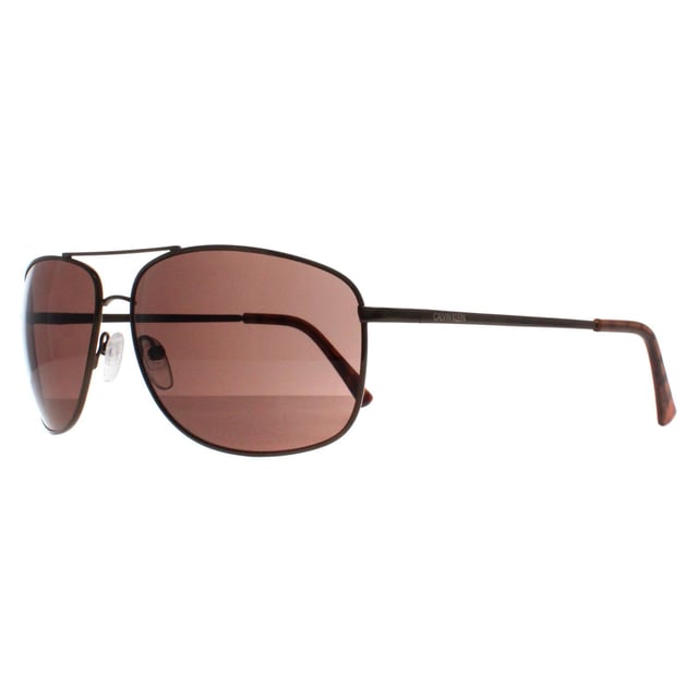Calvin Klein Rectangle Mens Brown Brown CK19137S  Sunglasses are a sleek and stylish accessory that blend modern design with classic sophistication. Featuring a rectangle frame crafted from lightweight yet durable acetate, these sunglasses offer both comfort and durability for daily wear. The design is minimalist, with clean lines and subtle branding on the temples, making them a versatile option for any outfit. The lenses provide UV protection, ensuring eye safety while maintaining a chic, high-fashion look.