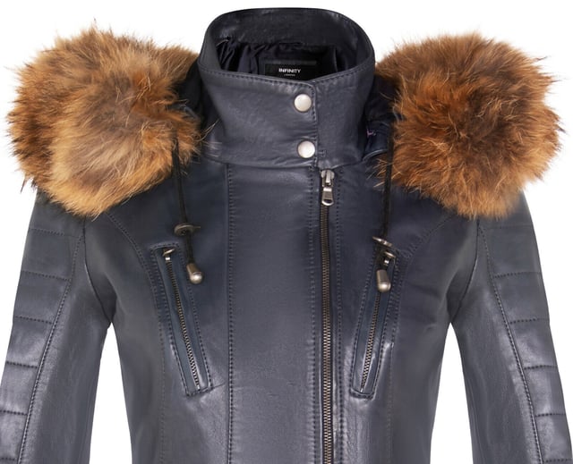 Elevate your winter wardrobe with our slim-fit Women's Leather Parka Jacket, a perfect choice for staying warm and stylish in colder weather. Crafted from 100% premium ultra-soft nappa leather, this jacket offers a luxurious and comfortable feel. Here's what sets it apart:

Detachable Fur-Lined Hood: The jacket features a detachable fur-lined hood, providing both warmth and an exuberant look that adds a touch of sophistication to your winter attire.
Functional Zip Pockets: Four zip pockets on the jacket front, tabbed for easy opening, offer secure and convenient storage for your essentials.
Luxurious Quilted Detailing: Quilted detailing on the sleeves and waist adds a touch of luxury and texture to the jacket's design, enhancing its visual appeal.
High Stand Collar: The high stand collar, fastened with press studs, not only keeps you warm but also adds a chic and elegant element to the overall look.
Zipped Cuffs: Zipped cuffs provide added adjustability and style, allowing you to customize the sleeve length according to your preference.
This Women's Leather Parka Jacket combines fashion, functionality, and premium quality, making it a must-have addition to your winter wardrobe for a chic and cozy look.
