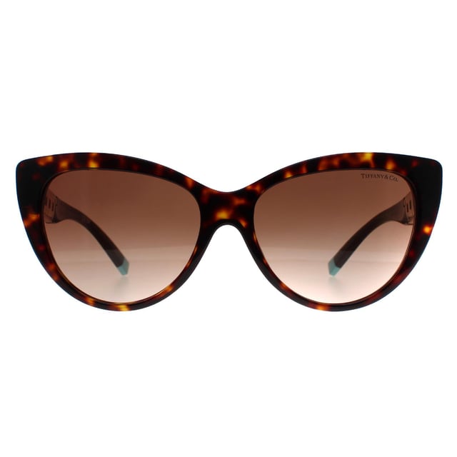 Tiffany TF4196 80153B havana gradiente marrón gafas de sol son un diseño moderno hecho de acetato de alta calidad, estas gafas de sol son a la vez ligero y duradero, por lo que son cómodos de usar durante largos períodos. El emblema de la cadena de la firma Tiffany & Co adorna las patillas de estas gafas de sol, añadiendo un toque de elegancia y sofisticación al diseño.