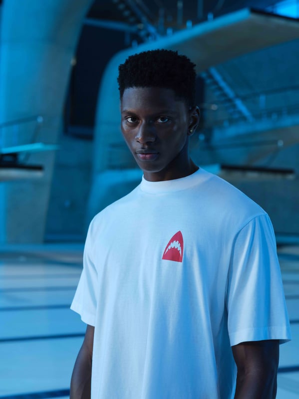 Turn heads in our LET'S SWIM print t-shirt. Featuring our iconic shark head logo on the front and back with brand manifesto printed underneath. Perfect for sharing with your fellow shark obsessed partner.
