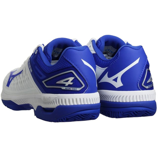 The Mizuno Wave Exceed Tour 4 CC Women's White Trainers are a stylish and high-performance footwear option designed for tennis enthusiasts and athletes seeking excellent comfort, support, and agility on the court. These trainers are part of Mizuno's renowned Wave Exceed Tour series, which is known for its cutting-edge technologies and innovation. Let's explore the key features of these tennis shoes:

Key Features:

 DynamotionFit Technology:  The trainers feature Mizuno's DynamotionFit technology, which ensures a secure and glove-like fit. This innovative design reduces stress on the foot and allows for natural movements, providing optimal comfort during intense gameplay.

 Wave Technology:  The Wave Exceed Tour 4 CC incorporates Mizuno's Wave technology in the midsole. The Wave plate enhances stability, cushioning, and responsiveness, providing excellent shock absorption and energy return during fast movements and abrupt stops.

 CC Sole Construction:  The trainers are equipped with a CC (Clay Court) sole construction, optimized for use on clay tennis courts. The outsole's herringbone pattern offers exceptional traction and grip, ensuring precise movements and rapid changes of direction.

 Lightweight and Breathable:  The upper of the trainers is crafted from lightweight and breathable materials, enhancing ventilation and reducing heat build-up. This keeps the feet cool and dry, even during extended matches.

 Durable Build:  Mizuno has designed these trainers with durability in mind. The reinforced toe cap and sturdy materials withstand the rigors of tennis play, ensuring the shoes remain in excellent condition over time.

 Padded Collar and Tongue:  The trainers feature a padded collar and tongue, providing additional comfort and reducing friction around the ankle area.