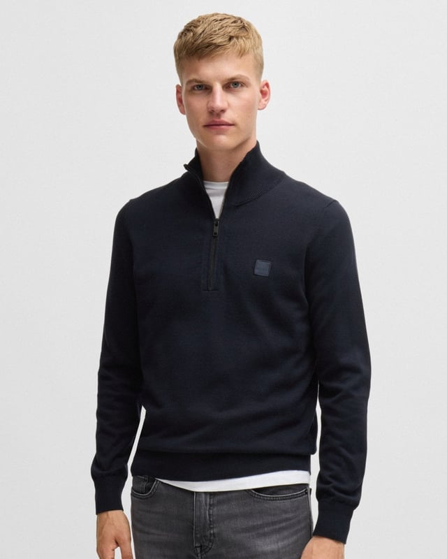 A regular-fit sweater trimmed with a logo patch by BOSS. This zip-neck layer is blended with cashmere for a super-soft touch. This product is partly made with organic cotton. Our organic standards do not allow the use of synthetic fertilisers, pesticides or genetically modified seeds.

Regular fit
Stand collar
Long sleeves
Standard length

95% Cotton, 5% Cashmere
50527585
 