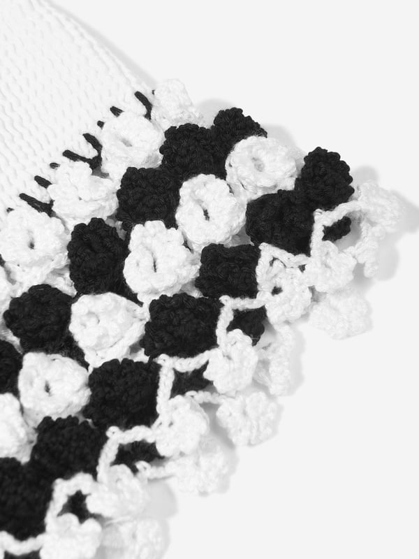 Nessi Byrd incorporate captivating materials into their everyday luxury swimwear. This girls Agave black girls skirt amplifies the New York label's passion for dynamic luxury and resortwear. Crafted with crochet accessories at the ends in a textured fabric and elasticated waistband. She will look and feel divine. Crochet Material 100% Cotton
