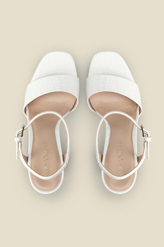 REASONS TO BUY:

Take your look to the next level
Platforms are trending
Luxe croc leather
You won't believe how comfy they are
Style with a silky blouse and flared jeans
Pair with a dress for weddings and parties.
