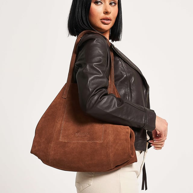 Barneys Originals real cow suede tote bag. Features a magnetic clasp fastening and two sturdy shoulder straps. Spacious and practical—perfect for an everyday work bag.