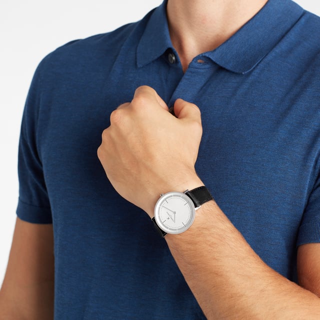 This Pierre Cardin Belleville Park Analogue Watch for Men is the perfect timepiece to wear or to gift. It's Silver 41 mm Round case combined with the comfortable Black Leather watch band will ensure you enjoy this stunning timepiece without any compromise. Operated by a high quality Quartz movement and water resistant to 3 bars, your watch will keep ticking. This casual and modern watch is perfect for all kind of casual activities, indoor activities or daily use, it's also a great gift for family and friend. High quality 21 cm length and  18 mm width Black Leather strap with a Buckle Case diameter: 41 mm,case thickness: 5.8 mm, case colour: Silver and dial colour: White