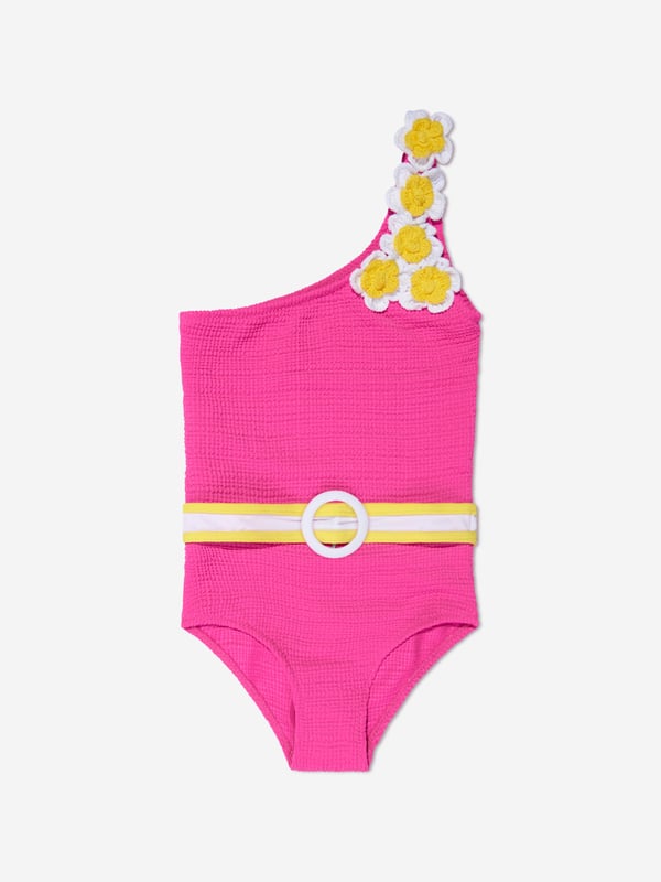 Introducing the exquisite Girls Pinko Asymmetrical Swimsuit by Nessi Byrd. It's every young girl's dream swimsuit for a stylish and fun Swim experience! Here's why your girl needs this gem: High-class Design: This glamorous swimsuit crafted in Pink flaunts a chic asymmetrical cut, ornate with an elegant touch for swim occasions. Invincible Comfort: Created from superior quality fabric, this swimsuit ensures utmost comfort, soft touch, and durability for every dive and splash your young one takes. Wardrobe Transformation: Elevate your girl's beach or pool style to new heights with this breathtaking swimsuit from Nessi Byrd. Grab it now and make your princess glow with confidence in every Swim!