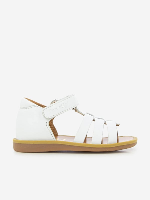 Introducing the Girls Leather Poppy Strap Sandals by Pom D Api in stunning white, perfect for your little girl's Holiday wardrobe. Check out its wonderful features: Chic Design: With an elegant poppy strap, these sandals infuse charm and style, making them a real show-stopper.Premium Quality: Crafted from exquisite genuine leather for unmatched comfort, these sandals are perfect for her delicate feet. Holiday Perfect: The crisp white colour makes these sandals versatile, pairing beautifully with any holiday ensemble.Redefine her wardrobe with these Girls Leather Poppy Strap Sandals in White from Pom D Api. Order now to gift her unparalleled comfort and style!