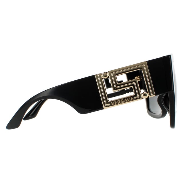 Versace Square Womens Black Dark Grey Sunglasses VE4402 are an eye-catching oversized square design crafted from chunky yet lightweight acetate. Wide temples are embellished with large metal Greca logos with laser cut Versace branding for authenticity.