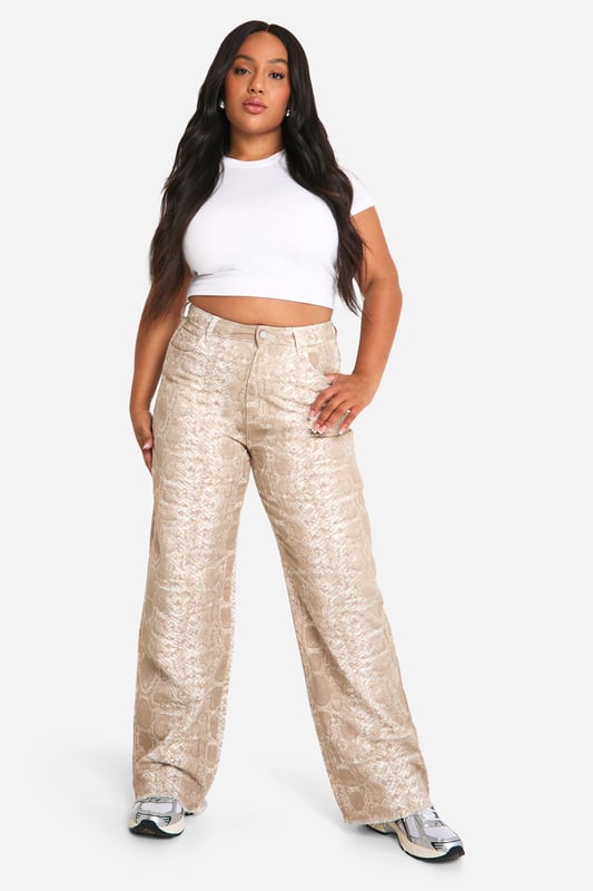 Wide leg silhouette for a relaxed, on-trend look
        Textured croc-print pattern adds visual interest
        High-rise waist for a flattering fit
        Denim fabric offers durability and comfort
        Versatile design suitable for various casual occasions
    
    Make a bold statement with these eye-catching plus-size jeans from Boohoo. The wide-leg silhouette combines comfort with style, while the unique croc-print pattern adds a touch of wild sophistication to your ensemble. Perfect for the fashion-forward woman who loves to stand out, these jeans can be dressed up or down for various casual events. Pair them with a crisp white crop top and trainers for a laid-back daytime look, or style with a sleek bodysuit and heeled boots for an evening out with friends. The high-rise waist flatters your curves, making these jeans an ideal choice for family gatherings or casual outings. Embrace your individuality and let your style roar with these standout denim trousers that are sure to turn heads wherever you go.