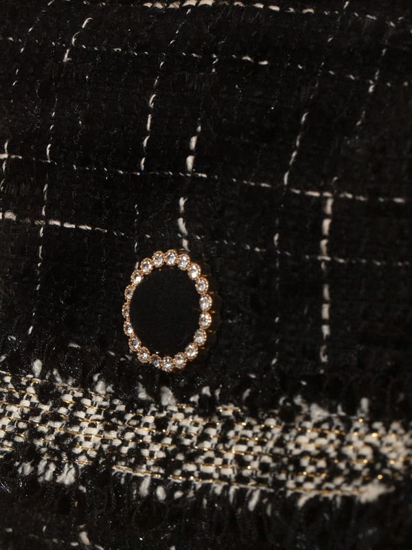 Patachou embody the finest high qualities this holiday season. This girls tweed handbag in black is reflective of the Portuguese label's passion for traditional abstracts. Made in a frayed tweed silhouette, it will be her favourite bag to show off this festive season.‚ Button Fastening‚ Shoulder Strap‚ Antiqued Hardware‚ Fabric: 100%