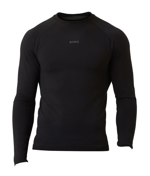Prepárate para tu próxima carrera con la camiseta de manga larga Björn Borg Seamless Running para hombre. Una camiseta de rendimiento de alta calidad fabricada con material transpirable. La camiseta de manga larga Björn Borg es una camiseta de alto rendimiento confeccionada con un suave tejido elástico de poliéster reciclado al 90%. El material también es de secado rápido para que no tengas que preocuparte por el sudor mientras entrenas.Esta camiseta de manga larga está hecha de un material transpirable que te mantendrá cómodo y seco mientras te mueves. Viene en un ajuste regular con un cuello redondo, una longitud más larga diseñada para incluir ejercicios por encima de la cabeza, y una espalda más larga para una cobertura extra, ideal para correr u otros deportes.Con una construcción de sisa más alta para un movimiento óptimo y el icónico logo Borg en el pecho le da a esta camiseta un toque de estilo que la convertirá en una favorita instantánea en tu armario.Esta camiseta está hecha de: 90% Poliéster (Reciclado), 10% Elastano y viene en 4 tallas: Pequeña, Mediana, Grande y X-Grande. Es de manga larga y se puede lavar a máquina.Detalles adicionales del productoCamiseta Björn Borg para hombreDe manga largaIdeal para correrAdecuada para otros deportesMaterial transpirableCorte regular y cuello redondoConstrucción de sisa más altaIcónico logotipo de Borg en el pechoSecado rápidoViene en negro90% poliéster recicladoDisponible en: S, M, L & XLLavable a máquina