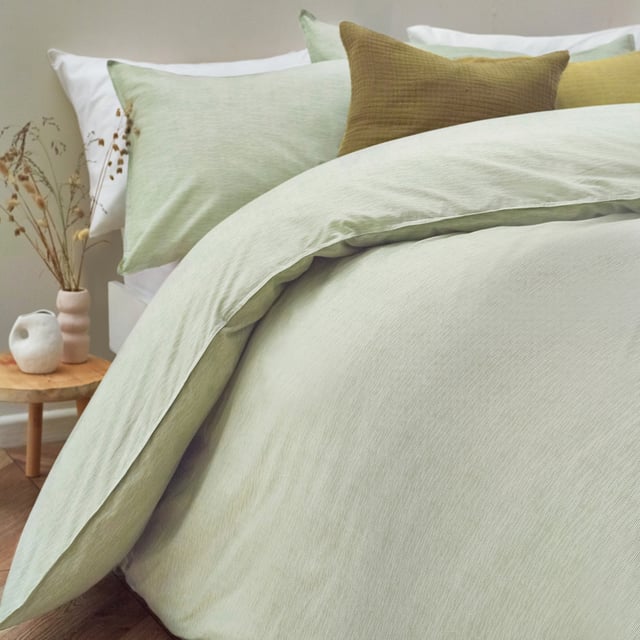 Minimalist yet modern, the Heaton Stripe duvet cover set is ideal for those who adore the relaxed-living aesthetic. Featuring a subtly textured, striped design, this 100% tumbled cotton bedding is complete with twin-needle stitch edging. Crafted from ultra-cosy, breathable fabric, this duvet set will become much softer with every wash! This product is certified by OEKO-TEX® MADE IN GREEN showing it has been sustainably made.