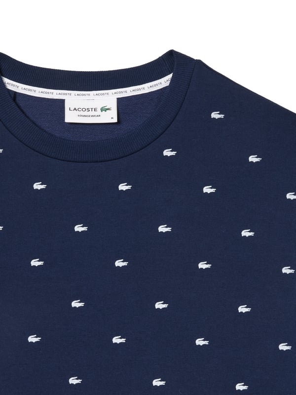 Warm, comfortable and cosy: this cotton fleece sweatshirt will keep you well dressed indoors and out. The round neckline, sleeves and hem are finished with ribbed cuffs. The all-over crocodile print makes this shirt a visual highlight in your closet.