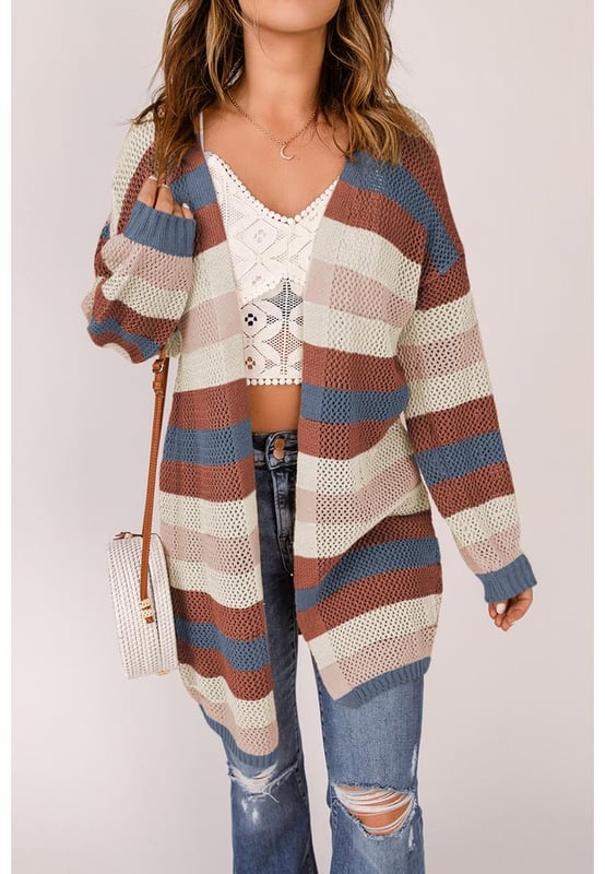 Striped color block design
  Hollowed knit pattern
  Made for women
  Relaxed fit
  Versatile and stylish
  Comfortable fabric
  Perfect for layering
  Elevates any outfit
Material: 55% Acrylic 45% Cotton