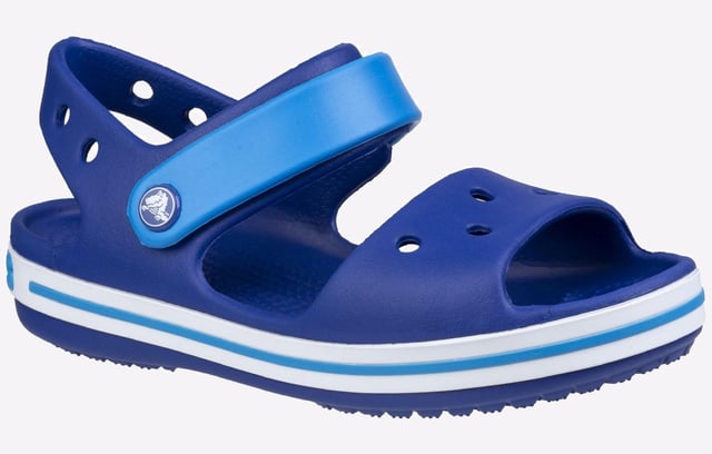 They will dazzle in our kids sandal with cute colours and a comfy fit. Jibbitz charm holes let them add a personal touch.
- Sporty Crocband style for little ones
- Croslite material cushions and comforts
- Heel and ankle strap for a more secure fit
- Comfort Rating: Iconic