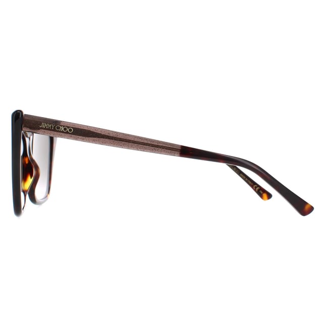 Jimmy Choo Cat Eye Womens Havana Brown Gradient LUCINE/S  Sunglasses are a elegant cat eye frame, enhancing your facial features while providing optimal sun protection. The high-quality acetate material used in their construction ensure durability and comfort, making them the ideal companion for both everyday wear and special occasions. The Jimmy Choo logo features on the temples for brand authenticity.