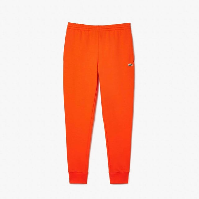 Heren Lacoste Organic Cotton Fleece Trackpants.- Slanke pasvorm, aangepast model: Comfortabel. Lichtgewicht.- Koord en geribde enkels: Een verstelbare tailleband voor comfort op maat.- Geborduurde krokodil op de voorkant genaaid: Handtekening Lacoste.- Geborsteld biologisch katoen fleece: Respecteert de planeet.