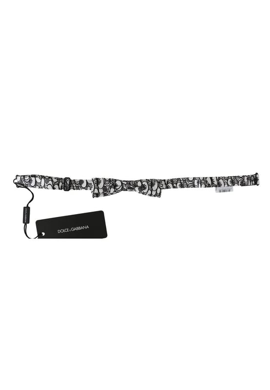 100% Authentic Dolce & Gabbana bow tie
  From the exclusive Dolce & Gabbana collection
  Color: White black with pattern
  Model: Tied
  Material: 100% Silk
  Adjustable length neck strap one size
  Made In Italy
  Original tags & store bag included