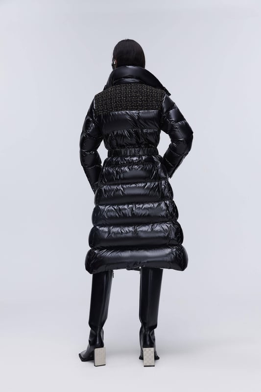 Elevate your urban commute with the Women's Premium Puffer Goose Down Jacket. Featuring low-saturation colour and artful pleats, this jacket exudes quiet luxury, blending simplicity with sophistication for a refined, yet understated look.
