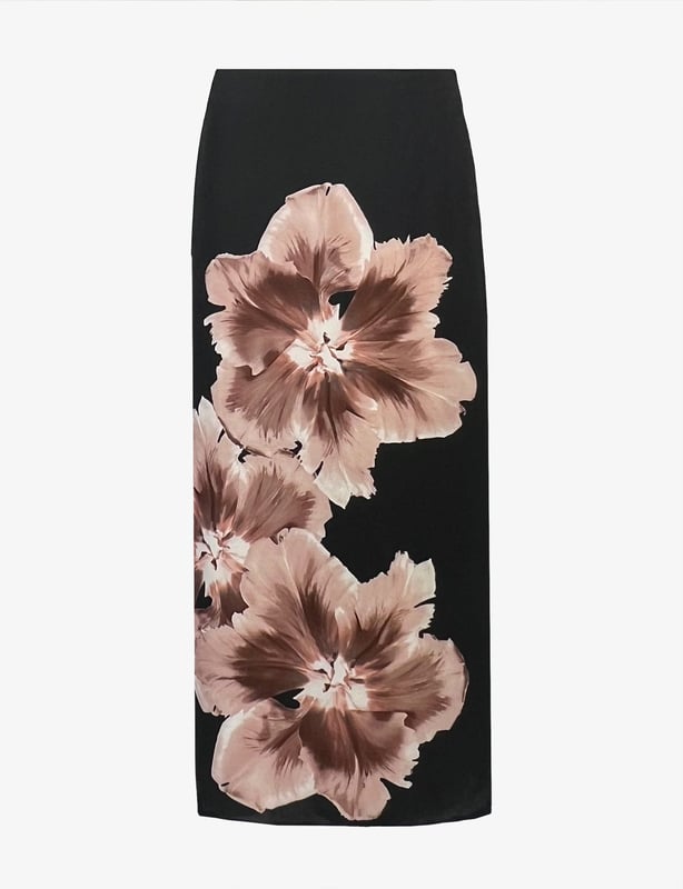 Co-founders' Notes

Our Mono Floral Placement Print Skirt is made from a recycled polyester mix satin back crepe, features a new mono floral design. This fully lined skirt includes a back zip, and a back skirt split for ease of wear. Its long midi length offers a stylish and comfortable fit.

Zip in back

Split in back skirt
Long midi length
True to size. Try your usual size



 Fabric &amp; Care



 Composition:   Main: 51% Recycled Polyester 49% Polyester Lining: 100% Viscose


 Garment Care:  Machine Washable


 Size &amp; Fit


True to size. Try your usual size

 Length: 90cm (size 10) 

Model is 170 cm/5'7" and is wearing a size 10