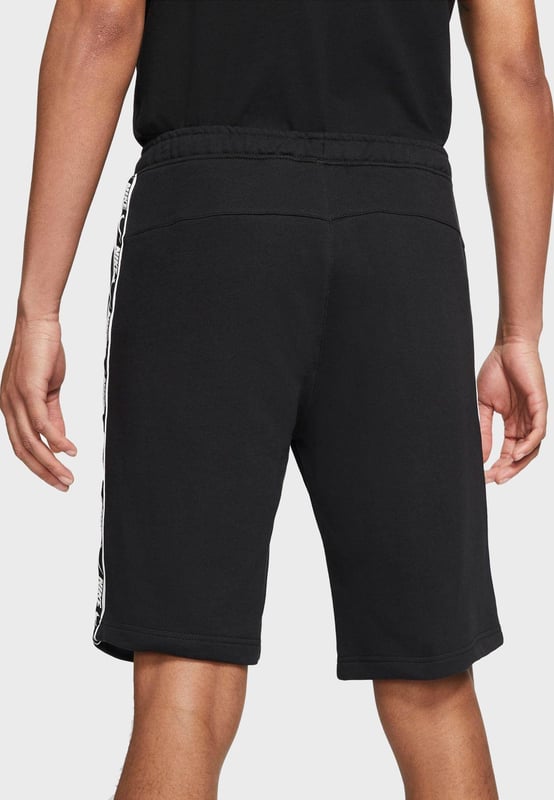 Nike NSW Sportswear Repeat Mens Fleece Shorts. 
Elastic Waistband with Adjustable Concealed Drawstring. 
Made From a Super-soft French Terry Fabric. 
Comfortable Cut Side Pockets. 
Repeat Tapes Branding Along the Legs.
80% Cotton, 20% Polyester.
Machine Washable.
