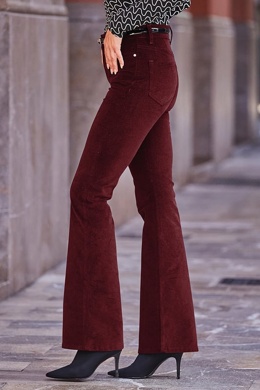 The jeans you never knew you neededKick flare cut makes your legs look so longPlush velvet fabric feels amazingLuxurious wine hueGo cosy with a chunky knit and bootsTake them out-out with strappies and a sparkly topInside leg to fit: Short 29" | Regular 31" | Long 33"