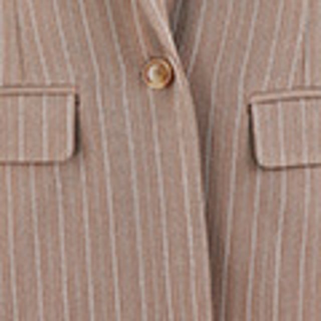 This blazer is perfect for adding some serious style points to your wardrobe. The pinstripe fabric is lightweight and looks incredible with the matching trousers and waistcoat sold separately. The fit is tailored slightly for a sophisticated look. With a single button fastening and pocket details.