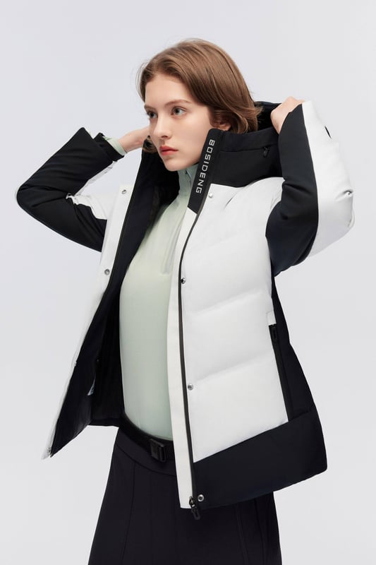 Blends advanced Gore-Tex windproof and waterproof technology with luxurious goose down insulation, offering lightweight warmth and contemporary style for active comfort and protection.