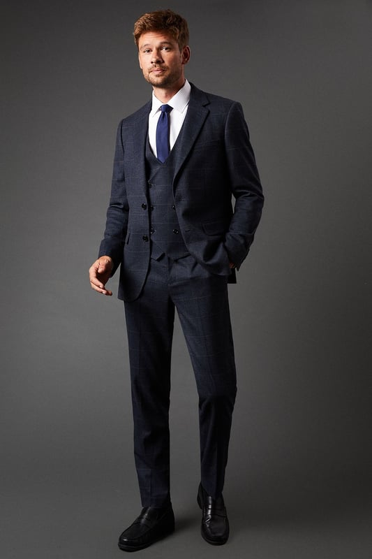 Tailored fit trousers for a refined silhouette
        Distinctive pow check pattern adds visual interest
        Side pockets for practicality
        Belt loops for versatile styling options
        Tapered leg design for a modern look
    
    These Burton pow check trousers offer a sophisticated twist on classic tailoring. The tailored fit sculpts your silhouette while providing comfort and ease of movement. Perfect for the discerning gentleman who appreciates timeless style with a contemporary edge. Pair with the matching jacket and waistcoat for a complete suit that commands attention at formal events or important business meetings. For a smart-casual ensemble, team with a crisp white shirt and leather brogues. The versatile design allows for effortless transition from day to night, making these trousers an essential addition to any well-curated wardrobe. Whether you're heading to the office, attending a wedding, or enjoying a night out at your local pub, these trousers will ensure you look polished and put-together.