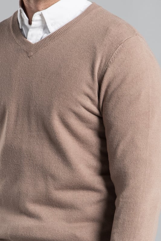 This V Neck jumper from Kensington Eastside is a season essential. Features long sleeves and ribbed elasticated neck, waistband and cuffs. Crafted from high-quality materials, this jumper is machine washable for easy care, making it both stylish and practical. Ideal for layering or wearing on its own, it's a versatile piece that complements any outfit.