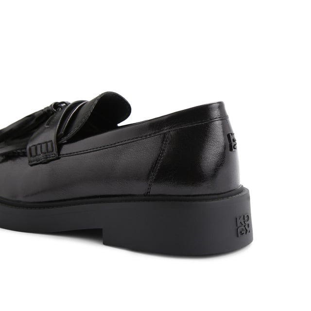 The KG Kurt Geiger Mack is a loafer featuring a black upper. There is a statement tassel detail on the toe.