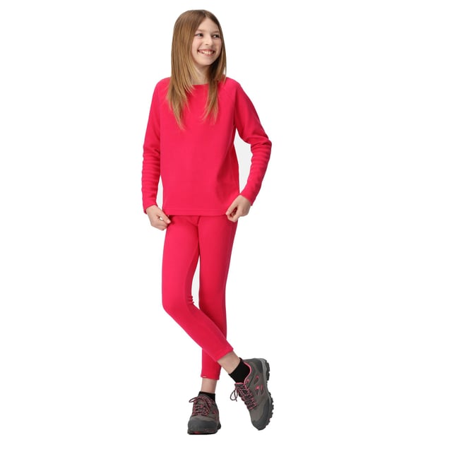 Regatta Girls Thermal Base Layer Leggings (Pink Potion) 100% Polyester. Design: Plain. 170gsm. Fabric Technology: Anti-Pilling, Durable, Insulating, Quick Dry, Symmetry Fleece, Thermal. Branded Tab. Length: Ankle. Fit: Fitted. Waistline: Elasticated. Sustainability: Made from Recycled Materials.
