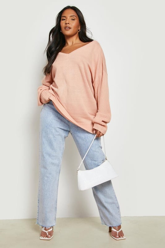 Upgrading your winter look is easy with this plus size jumper from our latest knitwear drop. Keeping you cosy with its soft fabric and knitted texture, it's perfect for layering over all your outfits, whether that's your go-to jeans or a long sleeve smock dress. Featuring long sleeves perfect for cold weather styling, this style is giving us all the cosy vibes. This season it's all about going big, so grab an  oversized plus size jumper to take your winter streetwear to new heights - just team with chunky boots and a dreamy coat.Style: JumperFabric: KnittedNeckline: V NeckSleeve Length: Long Sleeve