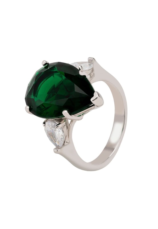 Introducing the Rania Teardrop Gemstone Ring Silver Emerald! This beautiful ring has a simple band with a large Pear shaped Emerald flanked by two heart-shaped simulated diamonds in the style of a Trilogy ring setting. It's a stunning statement piece that is perfect for any occasion!As the birthstone for May, the emerald, a symbol of rebirth, is believed to grant the owner foresight, good fortune, and youth. Emerald, derived from the word “smaragdus,” means, quite literally, “green” in Greek.As the birthstone for May, this ring would make an extra thoughtful gift for anyone with a May birthday.The ring comes in three sizes so you can find the perfect fit. The Emerald gemstone measures 1.3 x 2.0 cm and weighs 6.3 grams.With its fashion-forward style and classic design, the Rania Teardrop Gemstone Ring is perfect for any fashion-savvy woman.