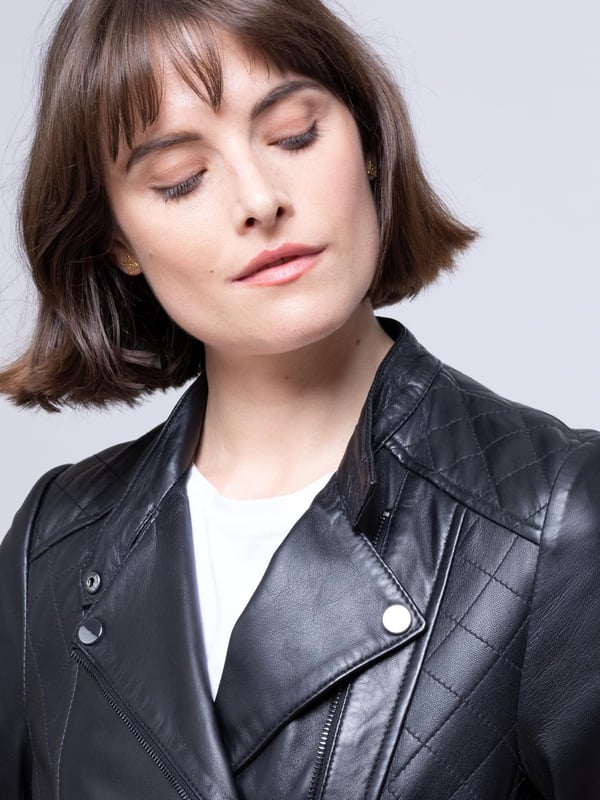We take a traditional black leather biker jacket and add a quilted twist. The Penny quilted biker jacket offers a whole new dimension to the world of biker-style jackets. Expect classic styling features, including the asymmetric zip and tab collar fastening, but the monotone hardware and luxuriously soft leather take the Penny to another level. Whatever style you want to carry, the Penny will work with you. From t-shirt and jeans to an evening dress, all perfectly complemented by the long tapered panels providing a flattering fit.