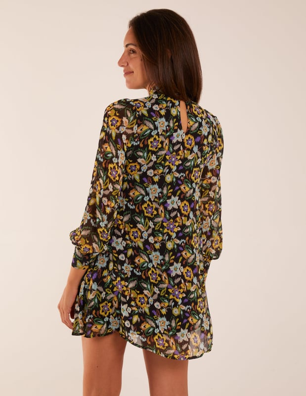 This chiffon swing dress provides everything you need this AW! Team this beautiful detailed dress with knee high boots and tights, along with a leather looked jacket to complete the look!
