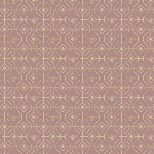 Make your boudoir buzz with the Bee Deco wallpaper featuring a honeycomb inspired geometric design completed with buzzing bumble bees. A soft blush hue sits behind metallic gold foil, bringing a contemporary colour scheme into your home. This wallpaper is a paste the wall application; simply paste the wall, hang your paper, and leave to dry. Each roll is 10m long and 52cm wide. Pattern repeat: 53cm Straight match. Our Bee Deco wallpaper can be used to paper the whole room or to create an eye-catching feature wall. This wallpaper is also wipeable so that any light marks can be dabbed away.