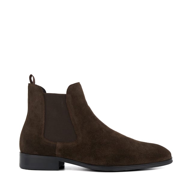 Dune Mens MANDATORY Chelsea Boots Mandatory Synonymous with Dune London, the Chelsea boot is a long-standing classic favoured for its transitional appeal. Signature style Mandatory perfectly blends a contemporary aesthetic with our iconic heritage. Crafted from the finest material and detailed with a quintessential elastic side gusset and grosgrain pull tab, this almond-toed silhouette has been set on a durable rubber outsole. Finished with tonal stitching, this timeless style will become a go-to dressing solution throughout the season.