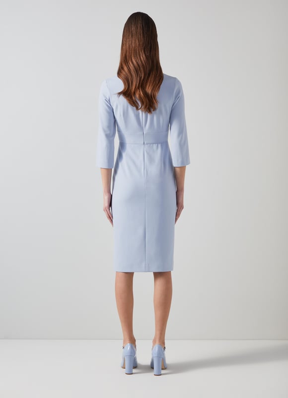 Beautifully tailored, totally timeless and kind to our planet, the new Sky shift is designed with dressy days in mind, because we all need that one dress that can do it all. Thoughtfully-made in Europe from a pale blue LENZING™ ECOVERO™ viscose* blend crepe, it's a shapely shift with a deep V-neck, three-quarter sleeves with flared cuffs, a nipped waist and a pencil skirt with slit detail. Wear it with courts and a tote for the office or with heels and a clutch for the fancier moments in your spring diary. 

*More about the fabric
LENZING™ ECOVERO™ viscose uses up to 50% less emissions and 50% less water than standard viscose. This fibre relies on wood pulp, and is crafted from sustaibly maged tree species such as beech, spruce and eucalyptus.