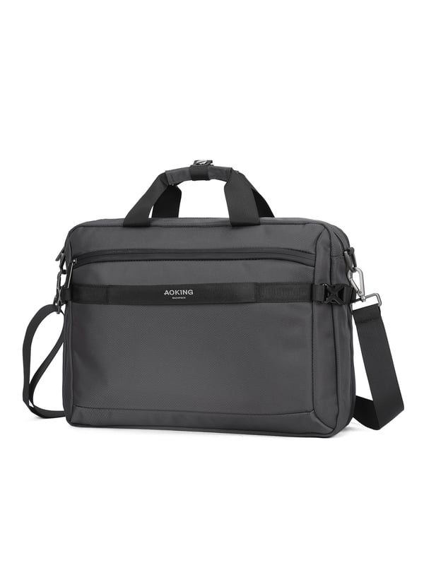 Bolso unisex. El cierre es con cremallera. Los bolsillos internos son bolsillos multifuncionales. Los bolsillos externos son dos delanteros con cremallera y uno trasero con cremallera. La bandolera es ajustable y extraíble en tejido. El asa es de tela. Hay tres compartimentos internos. El material exterior es poliéster. Internamente está forrado en poliéster. Medidas: 40,5x10x29 cm. Producto de moda