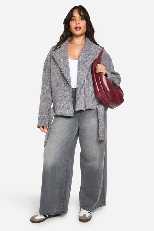 Plus Boucle Belted Biker Jacket boohoo PlusYou’ll find full on fashion for the fuller figure with the boohoo Plus range. Delivering directional designs for UK sizes 16 to 24, this ultra-flattering collection combines perfectly proportioned fits with statement styles so that you can stay on top of this season’s trends.