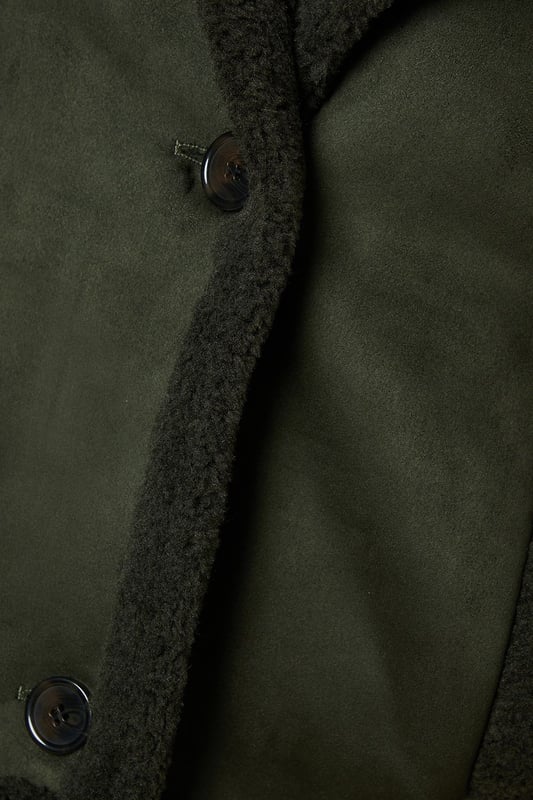 Cropped aviator-style jacket with suede-like finish
        Plush shearling-effect collar and lining for warmth
        Double-breasted front with button fastenings
        Relaxed fit with dropped shoulders for easy layering
        Side pockets for practicality and style
    
    Embrace the cool-weather season with this chic suede cropped aviator jacket from Dorothy Perkins. Perfect for the fashion-forward woman who values both style and comfort, this versatile piece is ideal for casual outings and family gatherings. The jacket's cropped silhouette adds a modern twist to the classic aviator style, while the plush shearling-effect details provide cosy warmth. Style it as seen on the model with a crisp white turtleneck, wide-leg trousers, and chunky boots for a trendy brunch look. Alternatively, throw it over a floral midi dress and ankle boots for a charming baby shower ensemble. The relaxed fit allows for easy layering, making it a go-to choice for unpredictable British weather. Whether you're meeting friends for coffee or running weekend errands, this jacket will keep you looking effortlessly stylish and feeling comfortable all day long.