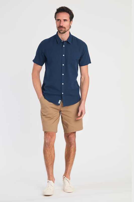 Blue Linen Blend Short Sleeve Button-Up Shirt With Chest Pocket Upgrade your summer wardrobe with this short-sleeved, linen shirt from Tokyo Laundry. Made from a breathable blend of linen and cotton, this shirt offers comfort and style with its classic fit. The shirt features button fastening and a chest pocket. Machine washable for easy care.