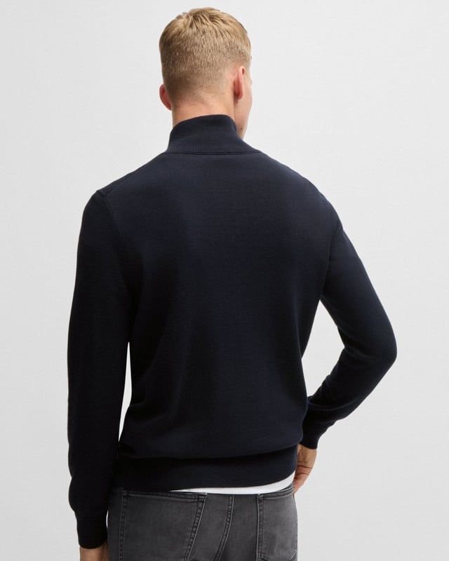 A regular-fit sweater trimmed with a logo patch by BOSS. This zip-neck layer is blended with cashmere for a super-soft touch. This product is partly made with organic cotton. Our organic standards do not allow the use of synthetic fertilisers, pesticides or genetically modified seeds.

Regular fit
Stand collar
Long sleeves
Standard length

95% Cotton, 5% Cashmere
50527585
 