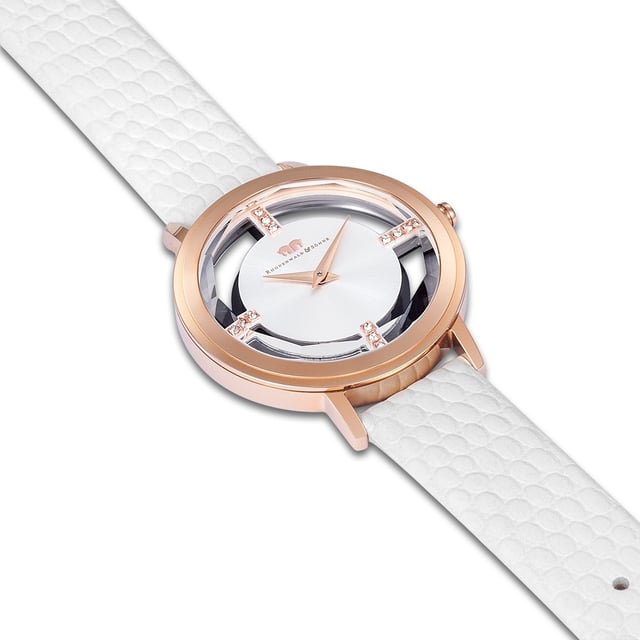 Do you love extraordinary watches? Then this timepiece of Rhodenwald & Sons should not be missing in your collection: Reduced functionality in connection with a contemporary interpretation of the skeleton-might traditional watchmaker art creates an eye-catcher on the wrist. A hint of skin between the dial and the bezel is cleverly bridged by four line indices, decorated with crystals from Swarovski®. The dial with Sunray cut and Dauphine additers ensures a fascinating play of light. A robust stainless steel housing with rose gold plating and a high-quality real leather strap with trendy carbon embossing complete the luxurious equipment.