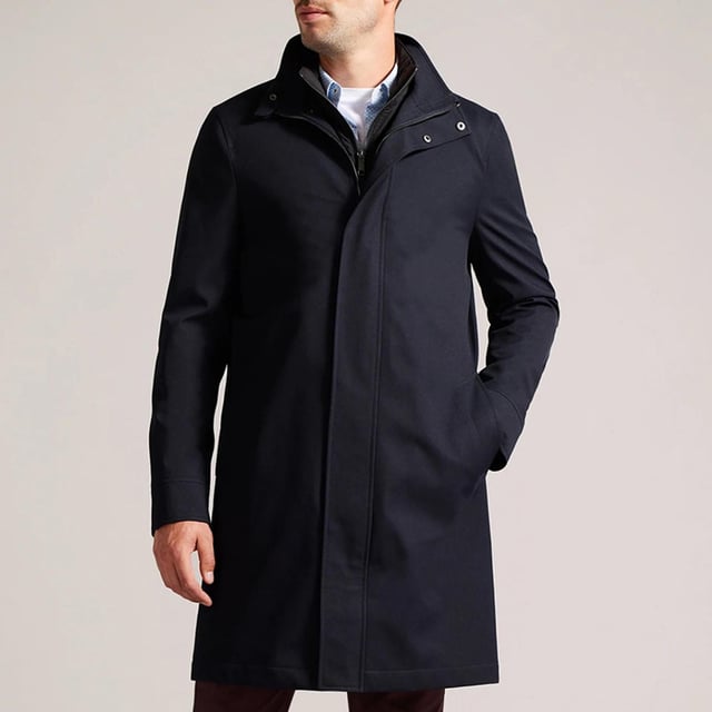 Men's Ted Baker Erolson Funnel Neck Coat in Navy.- Funnel neck.- Zip and popper fastening.- Pockets.- Removable quilted lining.- Mid-length.- Material: 100% Polyester. Ref: 272518NAVY.
